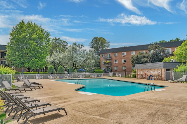 520 Burning Tree Ln Unit 306, Naperville, IL 60563 - community pool featuring a patio area