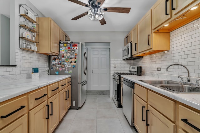 520 Burning Tree Ln Unit 306, Naperville, IL 60563 - kitchen with appliances with stainless steel finishes, ceiling fan, light brown cabinetry, tasteful backsplash, and light tile patterned floors