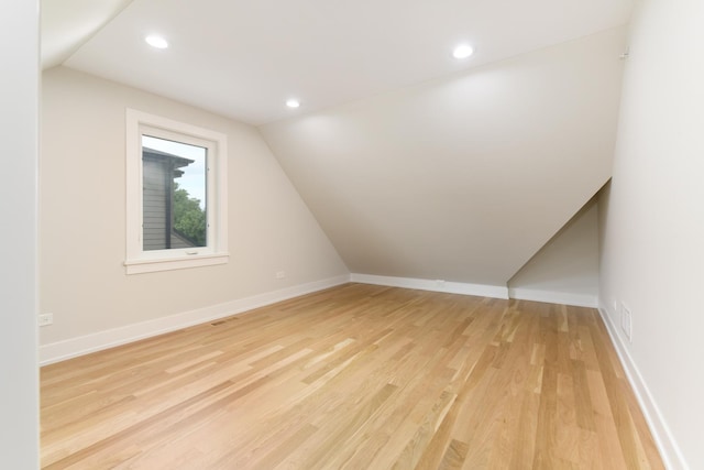 5309 Crain St, Skokie, IL 60077 - bonus room with lofted ceiling, light wood-style floors, and recessed lighting
