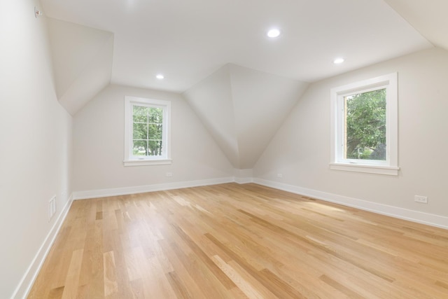 5309 Crain St, Skokie, IL 60077 - bonus room featuring light wood-style flooring, vaulted ceiling, and recessed lighting