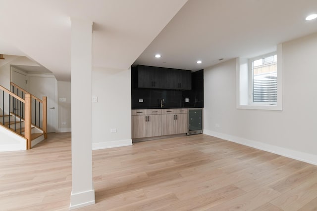 5309 Crain St, Skokie, IL 60077 - bar with light wood finished floors, stairs, recessed lighting, decorative backsplash, and wine cooler