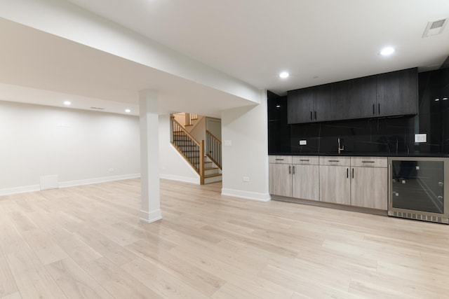 5309 Crain St, Skokie, IL 60077 - indoor bar featuring wine cooler, decorative backsplash, stairway, light wood-type flooring, and recessed lighting