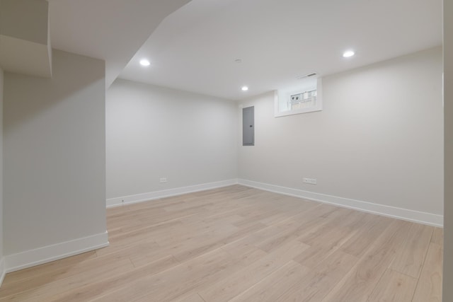 5309 Crain St, Skokie, IL 60077 - basement with electric panel, recessed lighting, and light wood finished floors
