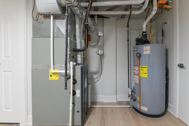 5309 Crain St, Skokie, IL 60077 - utility room with gas water heater