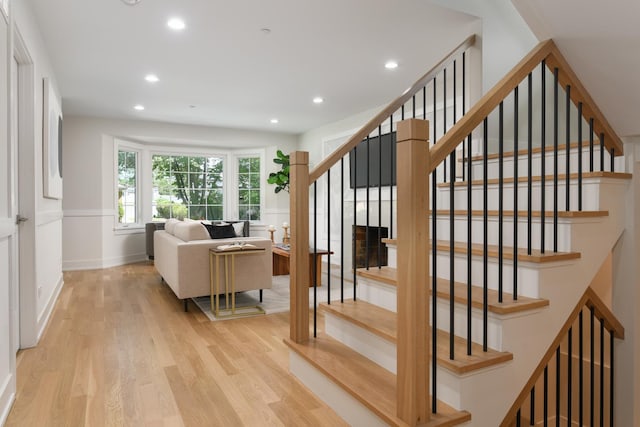 5309 Crain St, Skokie, IL 60077 - staircase featuring wood finished floors and recessed lighting