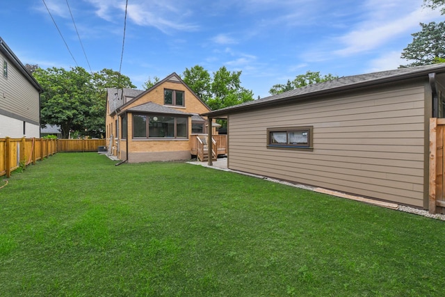 5309 Crain St, Skokie, IL 60077 - rear view of house with a fenced backyard