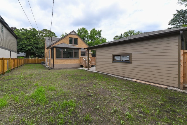 5309 Crain St, Skokie, IL 60077 - rear view of property with a fenced backyard