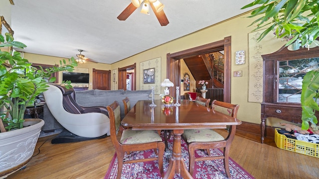 123 E 3rd St, Byron, IL 61010 - dining space with a ceiling fan and wood finished floors