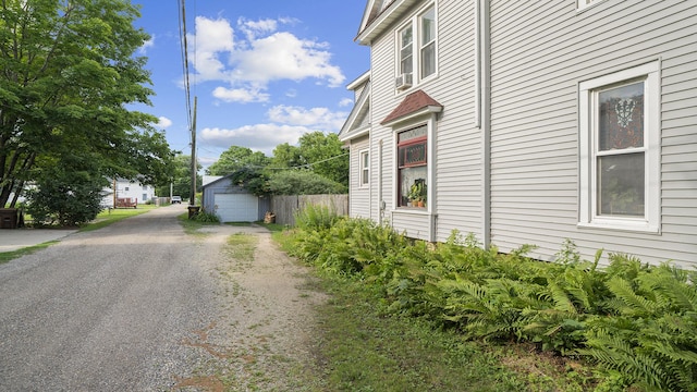 123 E 3rd St, Byron, IL 61010 - view of property exterior with an outbuilding