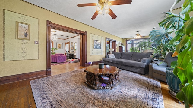 123 E 3rd St, Byron, IL 61010 - living room featuring ceiling fan and wood finished floors