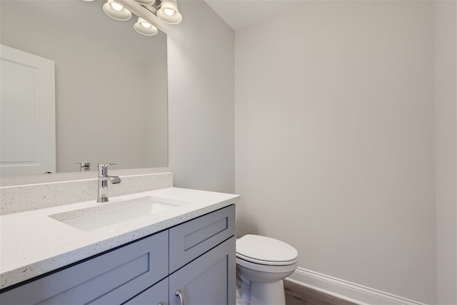 21210 Shannon Dr, Matteson, IL 60443 - half bathroom featuring vanity and wood finished floors