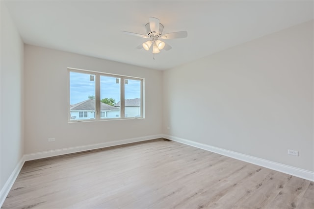 21210 Shannon Dr, Matteson, IL 60443 - empty room with light wood-style flooring and ceiling fan
