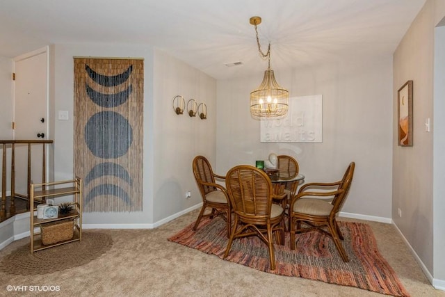 1441 Haverhill Dr Unit B, Wheaton, IL 60189 - carpeted dining area featuring a chandelier and baseboards