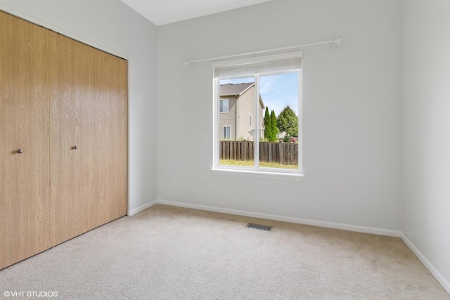 2715 Hoffman St, Plano, IL 60545 - unfurnished bedroom with carpet and a closet