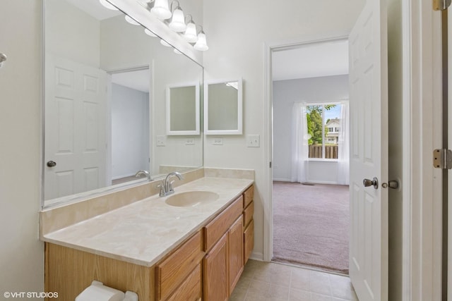 2715 Hoffman St, Plano, IL 60545 - bathroom featuring vanity and tile patterned flooring