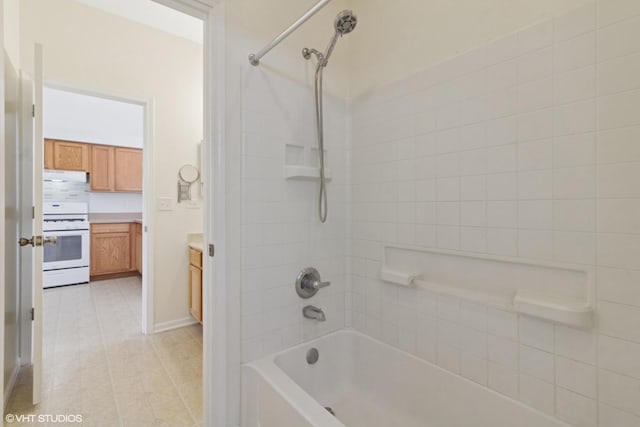 2715 Hoffman St, Plano, IL 60545 - bathroom with tub / shower combination, tile patterned floors, and vanity
