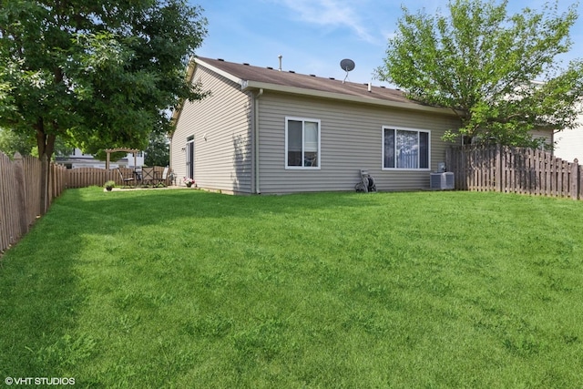 2715 Hoffman St, Plano, IL 60545 - rear view of house with a fenced backyard