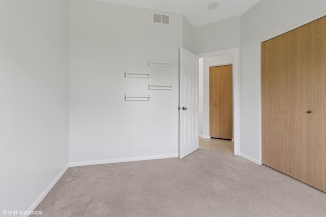 2715 Hoffman St, Plano, IL 60545 - unfurnished bedroom featuring light carpet and a closet