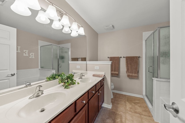 2406 Georgetown Cir, Aurora, IL 60503 - bathroom featuring a stall shower, double vanity, tile patterned floors, and a bath
