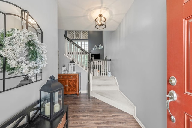 2406 Georgetown Cir, Aurora, IL 60503 - entryway with stairway, dark wood-style flooring, and a chandelier