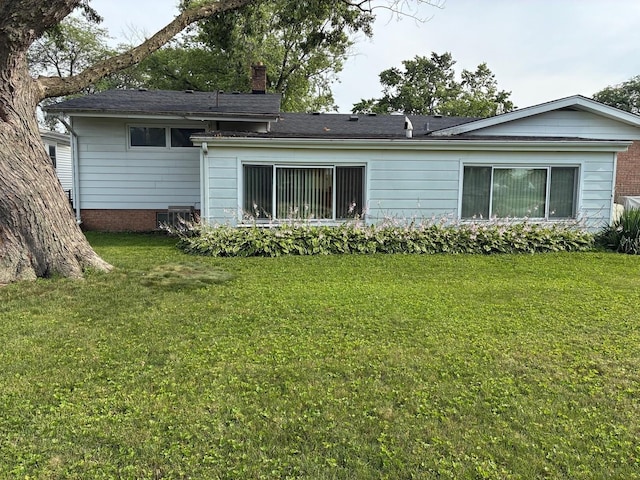 10 Lombard Cir, Lombard, IL 60148 - back of property featuring a yard and a chimney