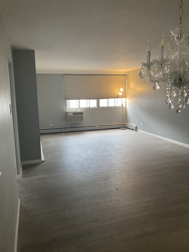 6300 N Sheridan Rd Unit 517, Chicago, IL 60660 - spare room with wood finished floors and a chandelier
