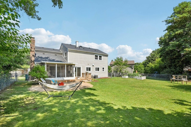 0N467 Cloos Ct, Winfield, IL 60190 - back of property with a sunroom, a fenced backyard, and a chimney