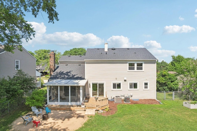 0N467 Cloos Ct, Winfield, IL 60190 - back of house with a sunroom, an outdoor fire pit, roof with shingles, a chimney, and a deck