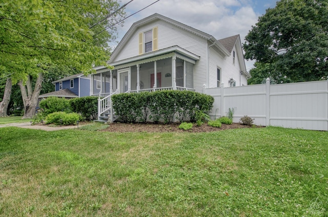 275 N Main St, Crystal Lake, IL 60014 - view of front of house featuring a sunroom