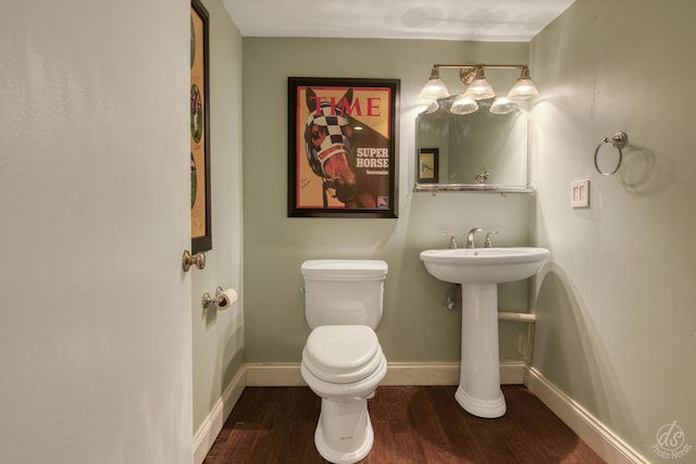 275 N Main St, Crystal Lake, IL 60014 - half bathroom featuring wood finished floors and toilet