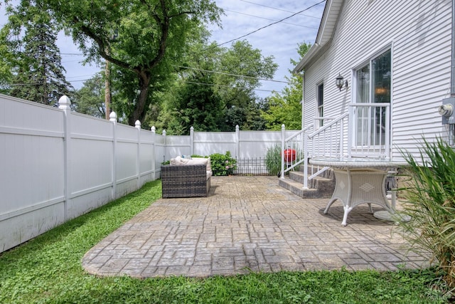 275 N Main St, Crystal Lake, IL 60014 - fenced backyard featuring a patio