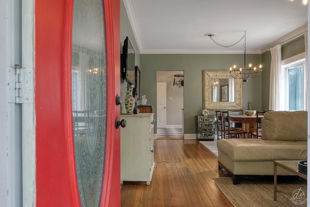 275 N Main St, Crystal Lake, IL 60014 - foyer with a chandelier, hardwood / wood-style floors, and crown molding