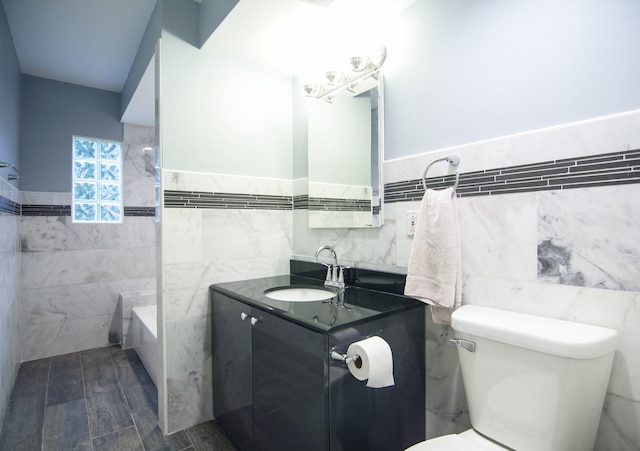 1033 S Main Dr, Lombard, IL 60148 - full bathroom with tile walls, vanity, a wainscoted wall, and washtub / shower combination