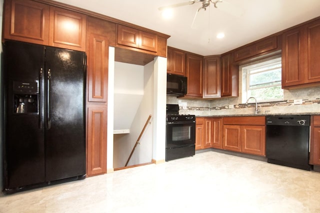 1033 S Main Dr, Lombard, IL 60148 - kitchen with black appliances, decorative backsplash, light stone counters, brown cabinets, and ceiling fan