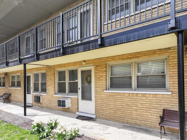 2336 Union St Unit 5, Blue Island, IL 60406 - view of exterior entry featuring a balcony and brick siding