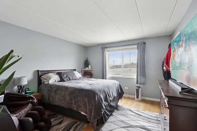 915 Graceland Ave Unit 1E, Des Plaines, IL 60016 - bedroom with light wood finished floors and baseboards