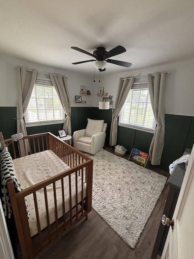 1805 Rock St, Peru, IL 61354 - bedroom with multiple windows, dark wood-style floors, and ceiling fan