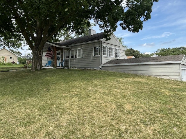 1805 Rock St, Peru, IL 61354 - back of house featuring a yard and a chimney