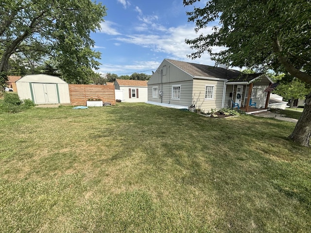 1805 Rock St, Peru, IL 61354 - view of grassy yard featuring a storage unit
