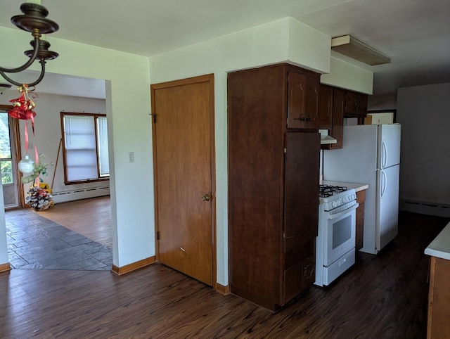 219 W 79th St, Burr Ridge, IL 60527 - kitchen featuring white gas stove, a baseboard radiator, under cabinet range hood, and light countertops