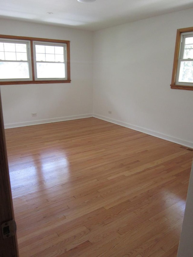 15831 Trumbull Ave, Markham, IL 60428 - empty room featuring light wood-style floors