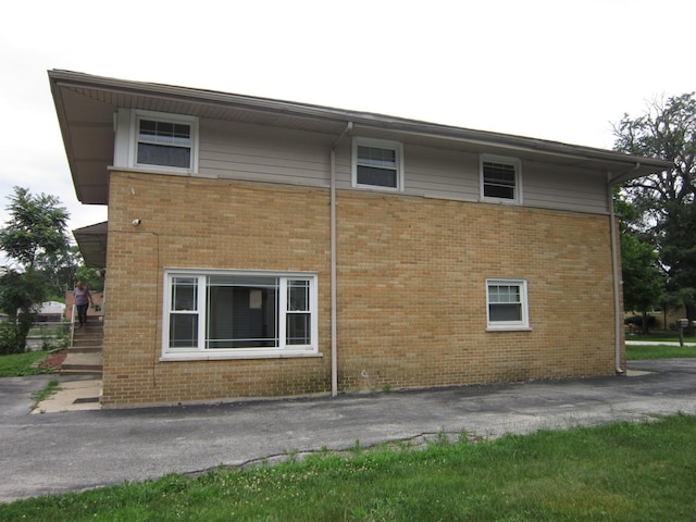 15831 Trumbull Ave, Markham, IL 60428 - view of side of property featuring brick siding and stairway