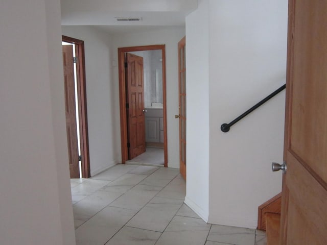 15831 Trumbull Ave, Markham, IL 60428 - corridor featuring light marble finish floors