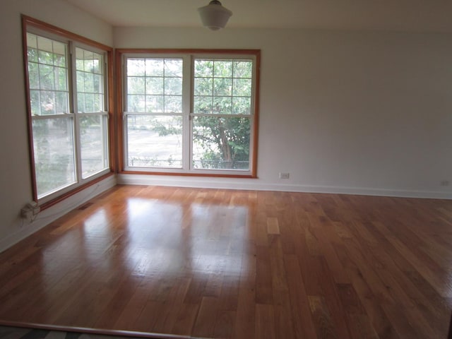 15831 Trumbull Ave, Markham, IL 60428 - empty room with baseboards and wood finished floors