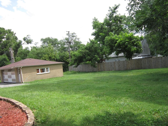 15831 Trumbull Ave, Markham, IL 60428 - view of yard featuring a garage
