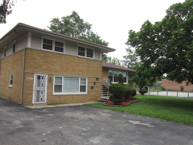 15831 Trumbull Ave, Markham, IL 60428 - split level home featuring brick siding