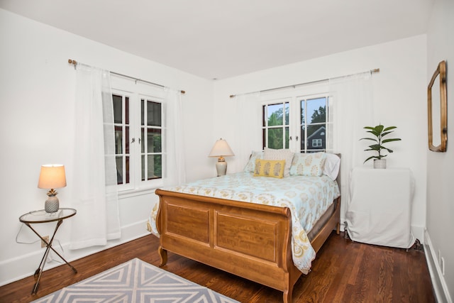 519 N Elmwood Ave, Oak Park, IL 60302 - bedroom featuring dark wood-style flooring and baseboards
