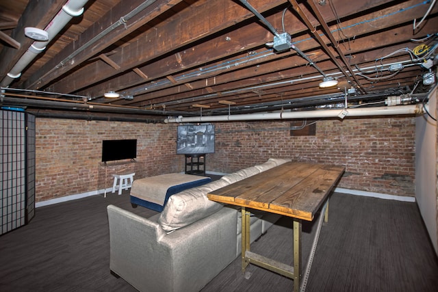 519 N Elmwood Ave, Oak Park, IL 60302 - basement with baseboards and brick wall