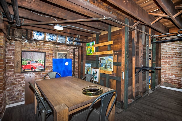 519 N Elmwood Ave, Oak Park, IL 60302 - dining room featuring brick wall and baseboards