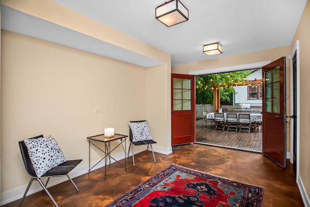 519 N Elmwood Ave, Oak Park, IL 60302 - entrance foyer with concrete flooring and baseboards